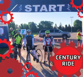 a photo of the starting line of the century ride, featuring bikers smiling, about to start their ride. The text reads, "century ride."