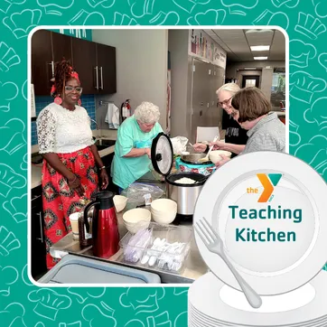 a group of people trying new foods in the teaching kitchen.