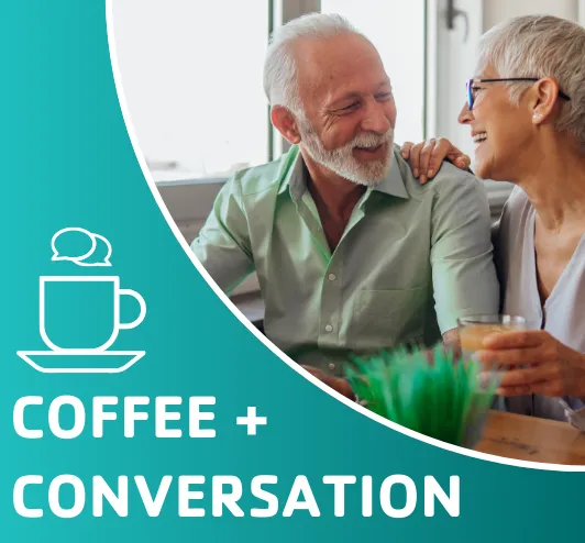 An older couple chatting over coffee.