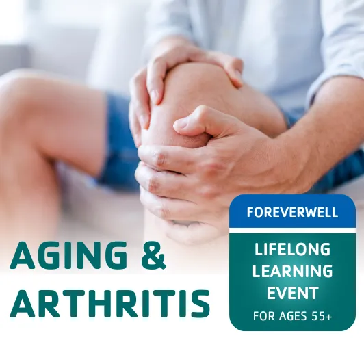 An older gentleman rubbing his knee.