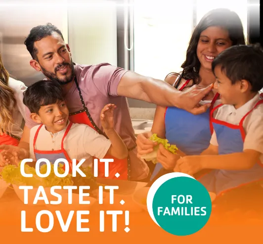 A big family having fun in the kitchen.