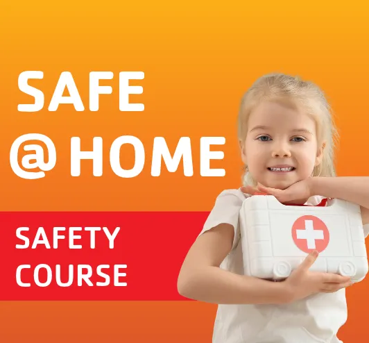 A little girl holding a first aid kit.