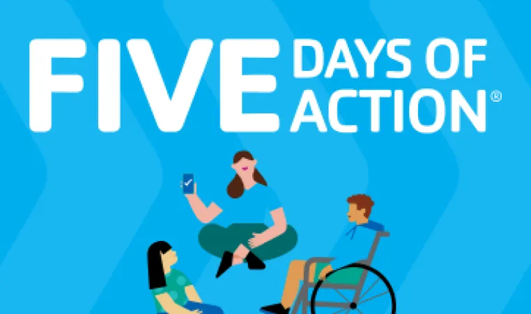 A group of kids sitting together.