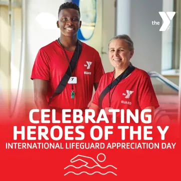 two YMCA lifeguards holding flotation devices.