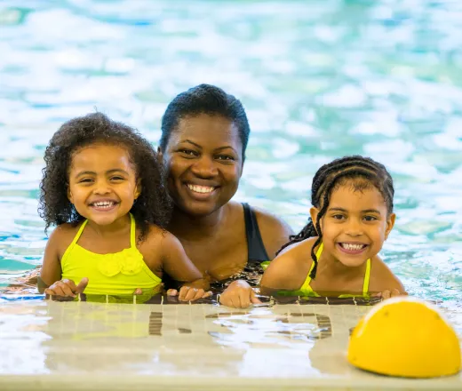 Family enjoying open swim time