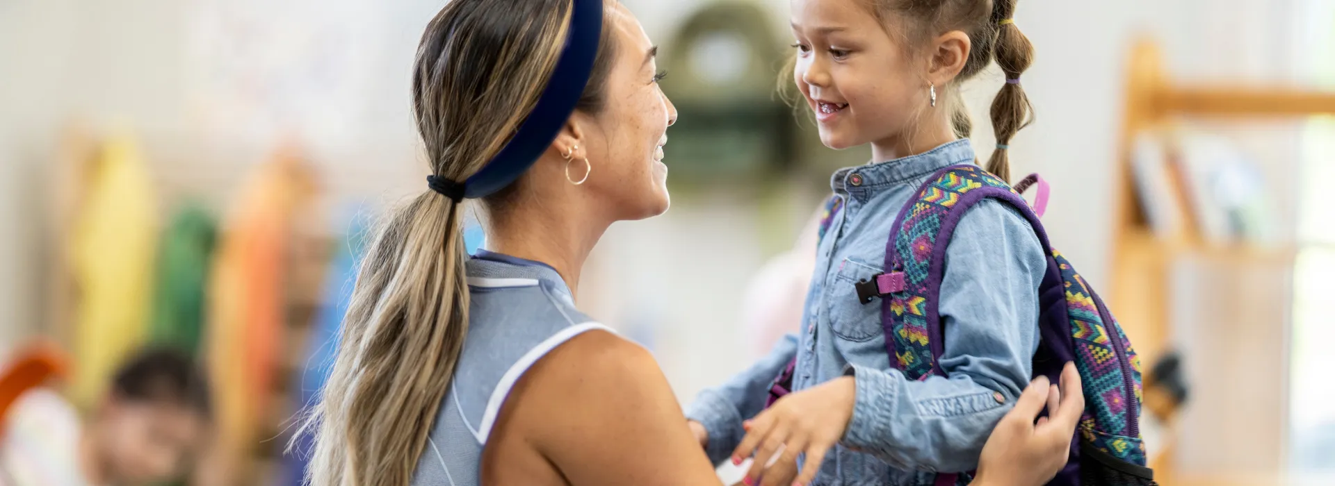 Mom and daughter at Child Watch